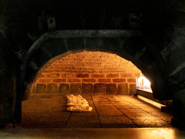 A technician checking a furnace
